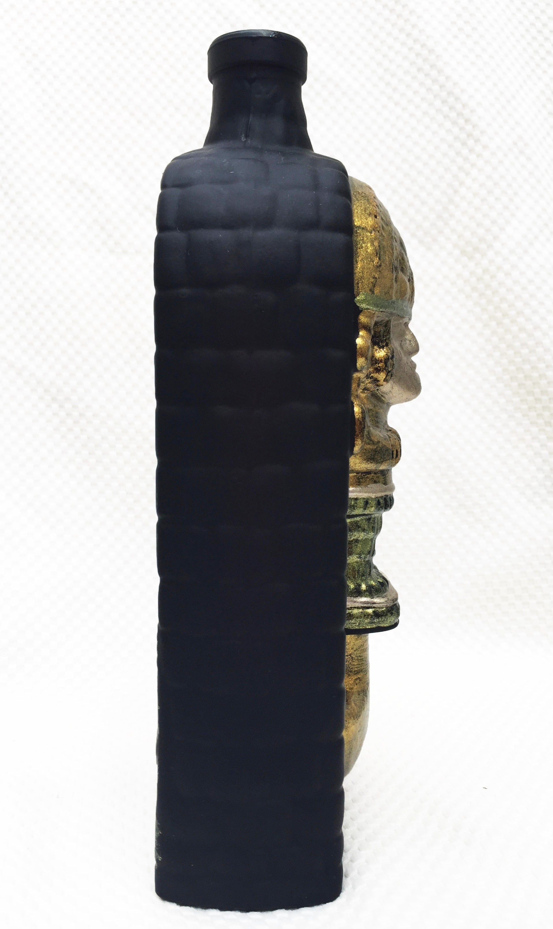 Hand-painted Pisco bottle with Tumi