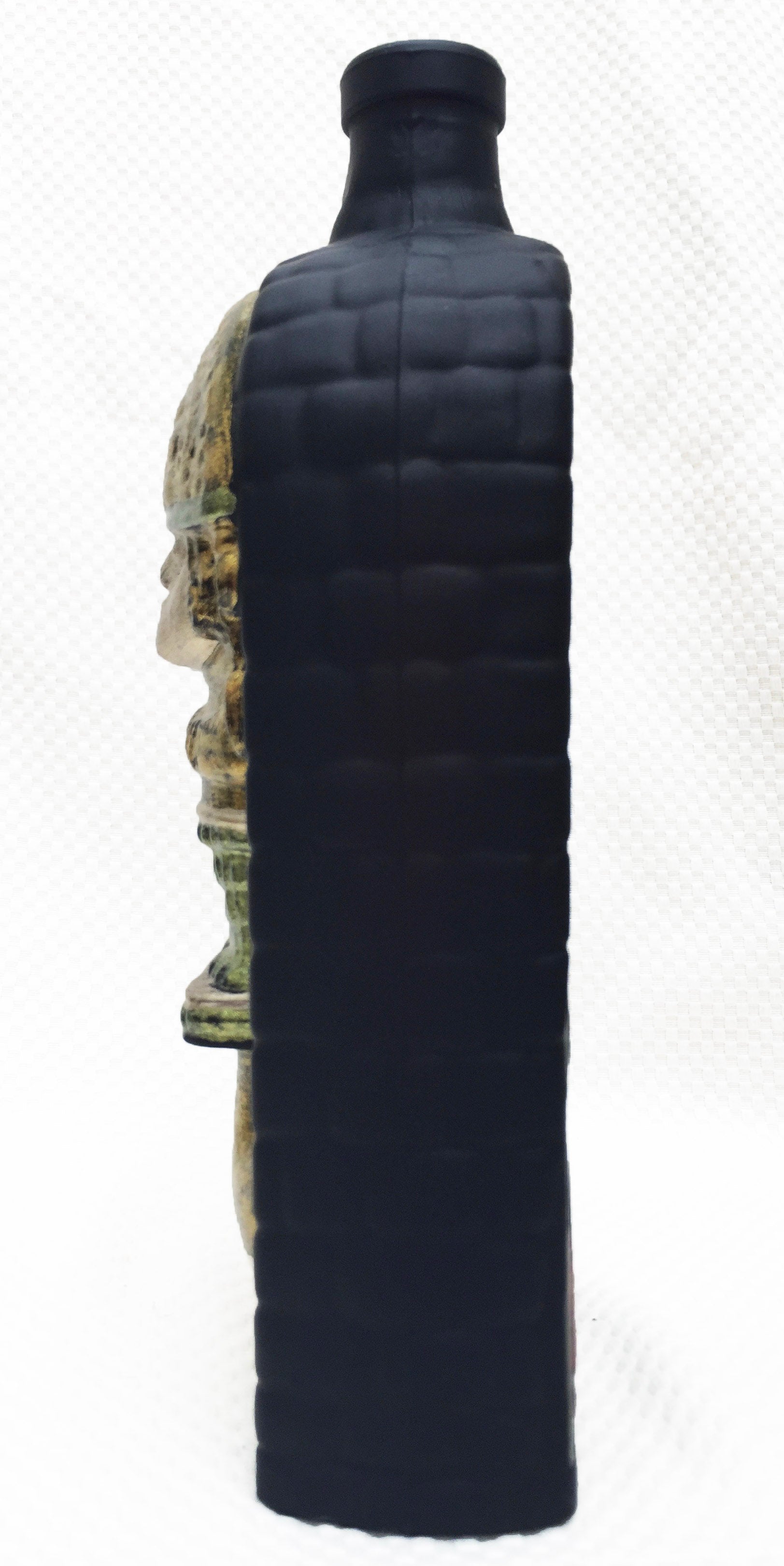 Hand-painted Pisco bottle with Tumi